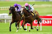 29 June 2025; Sujet with Chris Hayes up, on their way to winning the Dubai Duty Free Handicap from second place Mississippi River with Ryan Moore during day three of the Dubai Duty Free Irish Derby Festival at The Curragh Racecourse in Kildare. Photo by Matt Browne/Sportsfile