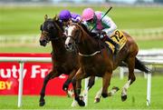 29 June 2025; Sujet with Chris Hayes up, on their way to winning the Dubai Duty Free Handicap from second place Mississippi River with Ryan Moore during day three of the Dubai Duty Free Irish Derby Festival at The Curragh Racecourse in Kildare. Photo by Matt Browne/Sportsfile