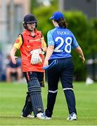 29 June 2025; Scorchers captain Christina Coulter Reilly, left, and Typhoons captain Jane Maguire after the Evoke Super 20 Trophy match between Typhoons and Scorchers at Railway Union Cricket Club in Dublin. Photo by Seb Daly/Sportsfile