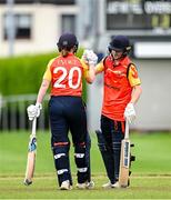 29 June 2025; Scorchers batters Christina Coulter Reilly, right, and Sophie MacMahon after the Evoke Super 20 Trophy match between Typhoons and Scorchers at Railway Union Cricket Club in Dublin. Photo by Seb Daly/Sportsfile