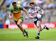 28 June 2025; Stephen O'Hanlon of Monaghan in action against Michael Langan of Donegal during the GAA Football All-Ireland Senior Championship quarter-final match between Monaghan and Donegal at Croke Park in Dublin. Photo by Piaras Ó Mídheach/Sportsfile
