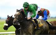 29 June 2025; Slieve Binnian, with Luke McAteer up, on their way to winning the Dubai Duty Free Derby Festival Handicap during day three of the Dubai Duty Free Irish Derby Festival at The Curragh Racecourse in Kildare. Photo by Matt Browne/Sportsfile
