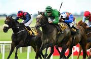 29 June 2025; Slieve Binnian, with Luke McAteer up, on their way to winning the Dubai Duty Free Derby Festival Handicap during day three of the Dubai Duty Free Irish Derby Festival at The Curragh Racecourse in Kildare. Photo by Matt Browne/Sportsfile