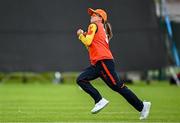29 June 2025; Scorchers fielder Ciara Gibson takes the wicket of Typhoons batter Rebecca Stokell during the Evoke Super 20 Trophy match between Typhoons and Scorchers at Railway Union Cricket Club in Dublin. Photo by Seb Daly/Sportsfile
