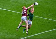 29 June 2025; Seán Coffey of Meath in action against Peter Cooke of Galway during the GAA Football All-Ireland Senior Championship quarter-final match between Meath and Galway at Croke Park in Dublin. Photo by Daire Brennan/Sportsfile