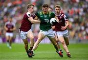 29 June 2025; Eoghan Frayne of Meath in action against Galway players Johnny McGrath, left, and Dylan McHugh during the GAA Football All-Ireland Senior Championship quarter-final match between Meath and Galway at Croke Park in Dublin. Photo by Shauna Clinton/Sportsfile