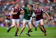 29 June 2025; Eoghan Frayne of Meath in action against Galway players Johnny McGrath, left, and Dylan McHugh during the GAA Football All-Ireland Senior Championship quarter-final match between Meath and Galway at Croke Park in Dublin. Photo by Shauna Clinton/Sportsfile