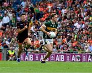 29 June 2025; Gavin White of Kerry in action against Niall Grimley of Armagh during the GAA Football All-Ireland Senior Championship quarter-final match between Armagh and Kerry at Croke Park in Dublin. Photo by Ray McManus/Sportsfile