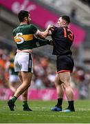 29 June 2025; Brian Ó Beaglaoich of Kerry and Oisin Conaty of Armagh tussle off the ball during the GAA Football All-Ireland Senior Championship quarter-final match between Armagh and Kerry at Croke Park in Dublin. Photo by Piaras Ó Mídheach/Sportsfile