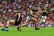 29 June 2025; Seán O'Shea of Kerry in action against Niall Grimley of Armagh during the GAA Football All-Ireland Senior Championship quarter-final match between Armagh and Kerry at Croke Park in Dublin. Photo by Ray McManus/Sportsfile