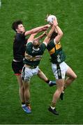 29 June 2025; Ben Crealey of Armagh in action against Mark O'Shea, left, and Seán O'Brien of Kerry during the GAA Football All-Ireland Senior Championship quarter-final match between Armagh and Kerry at Croke Park in Dublin. Photo by Daire Brennan/Sportsfile