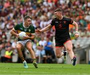29 June 2025; Graham O'Sullivan of Kerry in action against Tiernan Kelly of Armagh during the GAA Football All-Ireland Senior Championship quarter-final match between Armagh and Kerry at Croke Park in Dublin. Photo by Ray McManus/Sportsfile