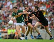 29 June 2025; David Clifford of Kerry in action against Ben Crealey of Armagh during the GAA Football All-Ireland Senior Championship quarter-final match between Armagh and Kerry at Croke Park in Dublin. Photo by Ray McManus/Sportsfile