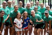 29 June 2025; Republic of Ireland players pose with young United States supporters during the team's match-day team walk in Cincinnati, ahead of their international friendly match against United States at TQL Stadium in Cincinnati, USA. Photo by Stephen McCarthy/Sportsfile