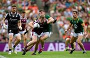 29 June 2025; Johnny McGrath of Galway in action against Eoghan Frayne of Meath during the GAA Football All-Ireland Senior Championship quarter-final match between Meath and Galway at Croke Park in Dublin. Photo by Shauna Clinton/Sportsfile