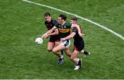 29 June 2025; David Clifford of Kerry in action against Barry McCambridge, left, and Tiernan Kelly of Armagh during the GAA Football All-Ireland Senior Championship quarter-final match between Armagh and Kerry at Croke Park in Dublin. Photo by Daire Brennan/Sportsfile