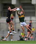 29 June 2025; Jarly Óg Burns of Armagh in action against Gavin White of Kerry during the GAA Football All-Ireland Senior Championship quarter-final match between Armagh and Kerry at Croke Park in Dublin. Photo by Piaras Ó Mídheach/Sportsfile
