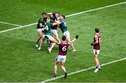 29 June 2025; Jack Glynn of Galway in action against Meath players, left to right, Seán Coffey, Keith Curtis, and Eoghan Frayne during the GAA Football All-Ireland Senior Championship quarter-final match between Meath and Galway at Croke Park in Dublin. Photo by Daire Brennan/Sportsfile