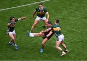 29 June 2025; Paddy Burns of Armagh in action against Kerry players, left to right, Conor Geaney, Graham O'Sullivan, and Tom O'Sullivan during the GAA Football All-Ireland Senior Championship quarter-final match between Armagh and Kerry at Croke Park in Dublin. Photo by Daire Brennan/Sportsfile