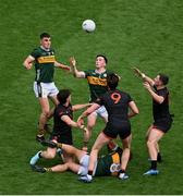 29 June 2025; Paul Murphy of Kerry in action against Armagh players, left to right, Joe McElroy, Ben Crealey, and Oisin Conaty during the GAA Football All-Ireland Senior Championship quarter-final match between Armagh and Kerry at Croke Park in Dublin. Photo by Daire Brennan/Sportsfile