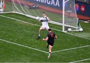 29 June 2025; Rory Grugan of Armagh scores his side's first goal past Kerry goalkeeper Shane Ryan during the GAA Football All-Ireland Senior Championship quarter-final match between Armagh and Kerry at Croke Park in Dublin. Photo by Daire Brennan/Sportsfile