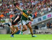 29 June 2025; Graham O'Sullivan of Kerry in action against Rory Grugan of Armagh during the GAA Football All-Ireland Senior Championship quarter-final match between Armagh and Kerry at Croke Park in Dublin. Photo by Ray McManus/Sportsfile
