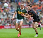 29 June 2025; Joe O'Connor of Kerry in action against Jarly Óg Burns of Armagh during the GAA Football All-Ireland Senior Championship quarter-final match between Armagh and Kerry at Croke Park in Dublin. Photo by Ray McManus/Sportsfile