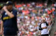 29 June 2025; Galway manager Padraic Joyce, right, and Meath manager Robbie Brennan during the GAA Football All-Ireland Senior Championship quarter-final match between Meath and Galway at Croke Park in Dublin. Photo by Shauna Clinton/Sportsfile
