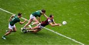 29 June 2025; John Maher of Galway in action against Adam O'Neill of Meath during the GAA Football All-Ireland Senior Championship quarter-final match between Meath and Galway at Croke Park in Dublin. Photo by Daire Brennan/Sportsfile