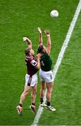 29 June 2025; Bryan Menton of Meath in action against Dylan McHugh of Galway during the GAA Football All-Ireland Senior Championship quarter-final match between Meath and Galway at Croke Park in Dublin. Photo by Daire Brennan/Sportsfile