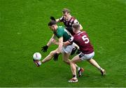 29 June 2025; Eoghan Frayne of Meath in action against Johnny McGrath, left, and Dylan McHugh of Galway during the GAA Football All-Ireland Senior Championship quarter-final match between Meath and Galway at Croke Park in Dublin. Photo by Daire Brennan/Sportsfile