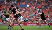 29 June 2025; Rory Grugan of Armagh makes a pass during the GAA Football All-Ireland Senior Championship quarter-final match between Armagh and Kerry at Croke Park in Dublin. Photo by Shauna Clinton/Sportsfile