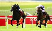 29 June 2025; Lambourn, with Ryan Moore up, on their way to winning the Dubai Duty Free Irish Derby from second place Serious Contender with Gavin Ryan during day three of the Dubai Duty Free Irish Derby Festival at The Curragh Racecourse in Kildare. Photo by Matt Browne/Sportsfile
