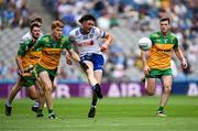 28 June 2025; Gary Mohan of Monaghan in action against Ciarán Moore, 7, and Eoghan Bán Gallagher of Donegal during the GAA Football All-Ireland Senior Championship quarter-final match between Monaghan and Donegal at Croke Park in Dublin. Photo by Ray McManus/Sportsfile