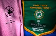 29 June 2025; A view of the pennant and jersey of Republic of Ireland captain and goalkeeper Courtney Brosnan in the dressing room before the women's international friendly match between the USA and Republic of Ireland at TQL Stadium in Cincinnati, Ohio, USA. Photo by Stephen McCarthy/Sportsfile
