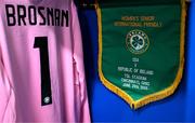 29 June 2025; A view of the pennant and jersey of Republic of Ireland captain and goalkeeper Courtney Brosnan in the dressing room before the women's international friendly match between the USA and Republic of Ireland at TQL Stadium in Cincinnati, Ohio, USA. Photo by Stephen McCarthy/Sportsfile