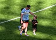 29 June 2025; A dejected Aidan Forker of Armagh with his son Leo after the GAA Football All-Ireland Senior Championship quarter-final match between Armagh and Kerry at Croke Park in Dublin. Photo by Daire Brennan/Sportsfile