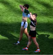 29 June 2025; David Clifford of Kerry and Aidan Forker of Armagh swap jerseys after the GAA Football All-Ireland Senior Championship quarter-final match between Armagh and Kerry at Croke Park in Dublin. Photo by Daire Brennan/Sportsfile
