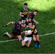 29 June 2025; Dylan Casey of Kerry in action against Rian O'Neill of Armagh during the GAA Football All-Ireland Senior Championship quarter-final match between Armagh and Kerry at Croke Park in Dublin. Photo by Daire Brennan/Sportsfile