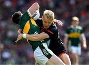 29 June 2025; Paul Murphy of Kerry is tackled by Cian McConville of Armagh during the GAA Football All-Ireland Senior Championship quarter-final match between Armagh and Kerry at Croke Park in Dublin. Photo by Ray McManus/Sportsfile