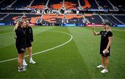 29 June 2025; Denise O’Sullivan, right, takes a photo with a smartphone of Ellen Molloy, left, and Erin McLaughlin of Republic of Ireland before the women's international friendly match between the USA and Republic of Ireland at TQL Stadium in Cincinnati, Ohio, USA. Photo by Stephen McCarthy/Sportsfile