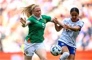 29 June 2025; Amber Barrett of Republic of Ireland in action against Jordyn Bugg of United States during the women's international friendly match between the USA and Republic of Ireland at TQL Stadium in Cincinnati, Ohio, USA. Photo by Stephen McCarthy/Sportsfile