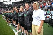 29 June 2025; Republic of Ireland staff, including head coach Carla Ward, right, stand for the national anthem before the women's international friendly match between the USA and Republic of Ireland at TQL Stadium in Cincinnati, Ohio, USA. Photo by Stephen McCarthy/Sportsfile