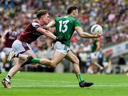 29 June 2025; Jordan Morris of Meath is tackled by Cian Hernon of Galway during the GAA Football All-Ireland Senior Championship quarter-final match between Meath and Galway at Croke Park in Dublin. Photo by Ray McManus/Sportsfile