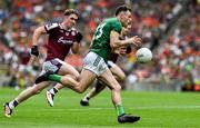 29 June 2025; Jordan Morris of Meath races clear of Cian Hernon of Galway during the GAA Football All-Ireland Senior Championship quarter-final match between Meath and Galway at Croke Park in Dublin. Photo by Ray McManus/Sportsfile