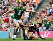 29 June 2025; Conor Gray of Meath about to shoot past Seán Fitzgerald of Galway to score a goal during the GAA Football All-Ireland Senior Championship quarter-final match between Meath and Galway at Croke Park in Dublin. Photo by Ray McManus/Sportsfile