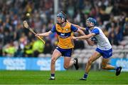 28 June 2025; Colm Daly of Clare in action against Bradley Penkert of Waterford during the Electric Ireland GAA Hurling All-Ireland Minor Championship final match between Waterford and Clare at FBD Semple Stadium in Thurles, Tipperary. Photo by Brendan Moran/Sportsfile