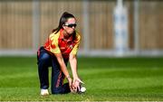 29 June 2025; Ava Canning of Scorchers fields the ball during the Evoke Super 20 Trophy match between Scorchers and Dragons at Railway Union Cricket Club in Dublin. Photo by Seb Daly/Sportsfile