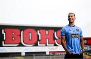 1 July 2025; Bohemians new signing Douglas James-Taylor poses for a portrait in the newly launched Oasis themed Bohemians jersey during his announcement at Dalymount Park in Dublin. Photo by Ramsey Cardy/Sportsfile