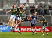 22 June 2025; Alex Tuohy and Maidhc Ó Sé of Kerry, right, gather possession from a kickout during the Electric Ireland GAA Football All-Ireland Minor Championship semi-final match between Kerry and Mayo at Zimmer Biomet Páirc Chíosóg in Ennis, Clare. Photo by Brendan Moran/Sportsfile